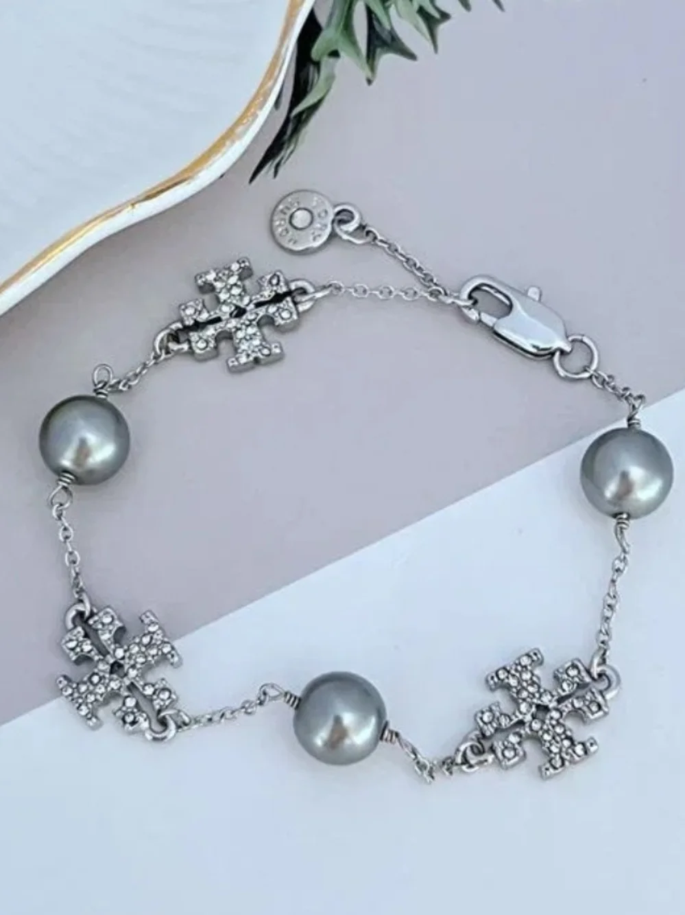 Tory Burch Silver-Tone Gray Pearl & Crystal Logo Bracelet
